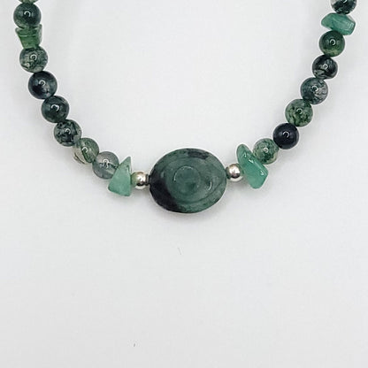 Emerald Evil Eye Necklace featuring Green Moss Agate and Emerald chip beads for heart healing and emotional balance.
