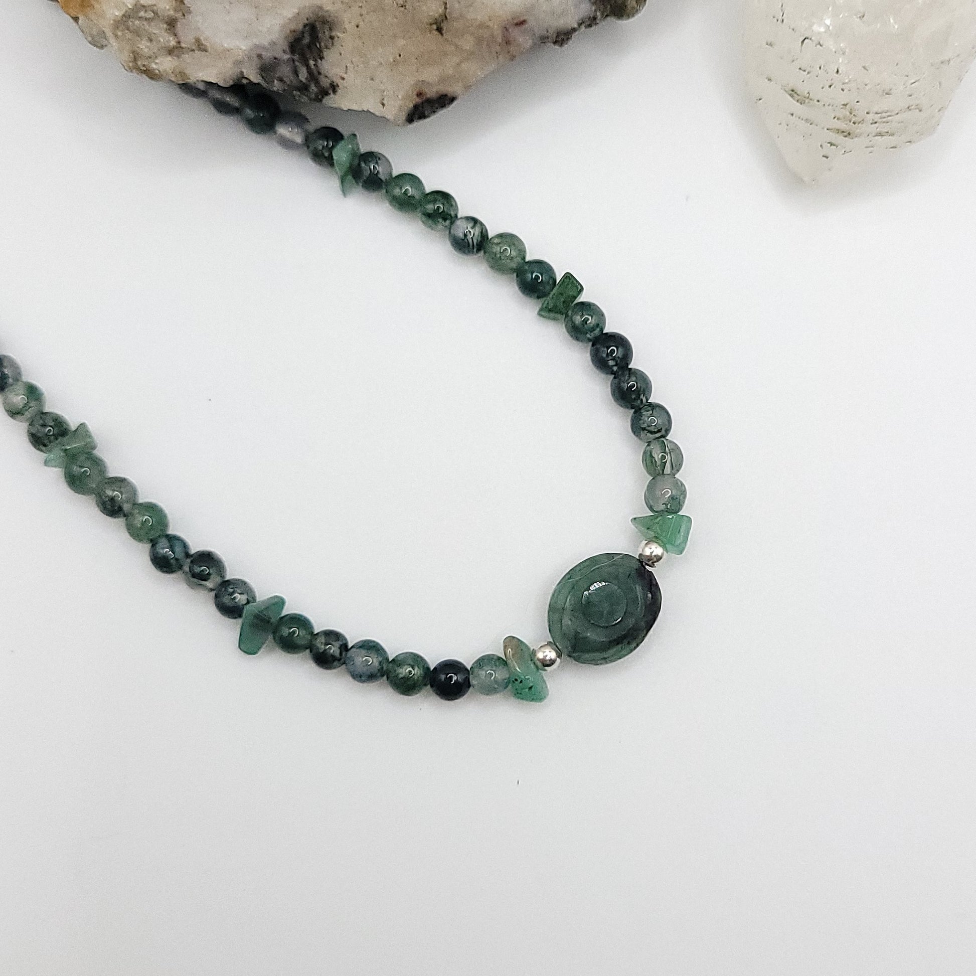 Emerald Evil Eye Necklace featuring Green Moss Agate and Emerald chip beads for heart healing and emotional balance.