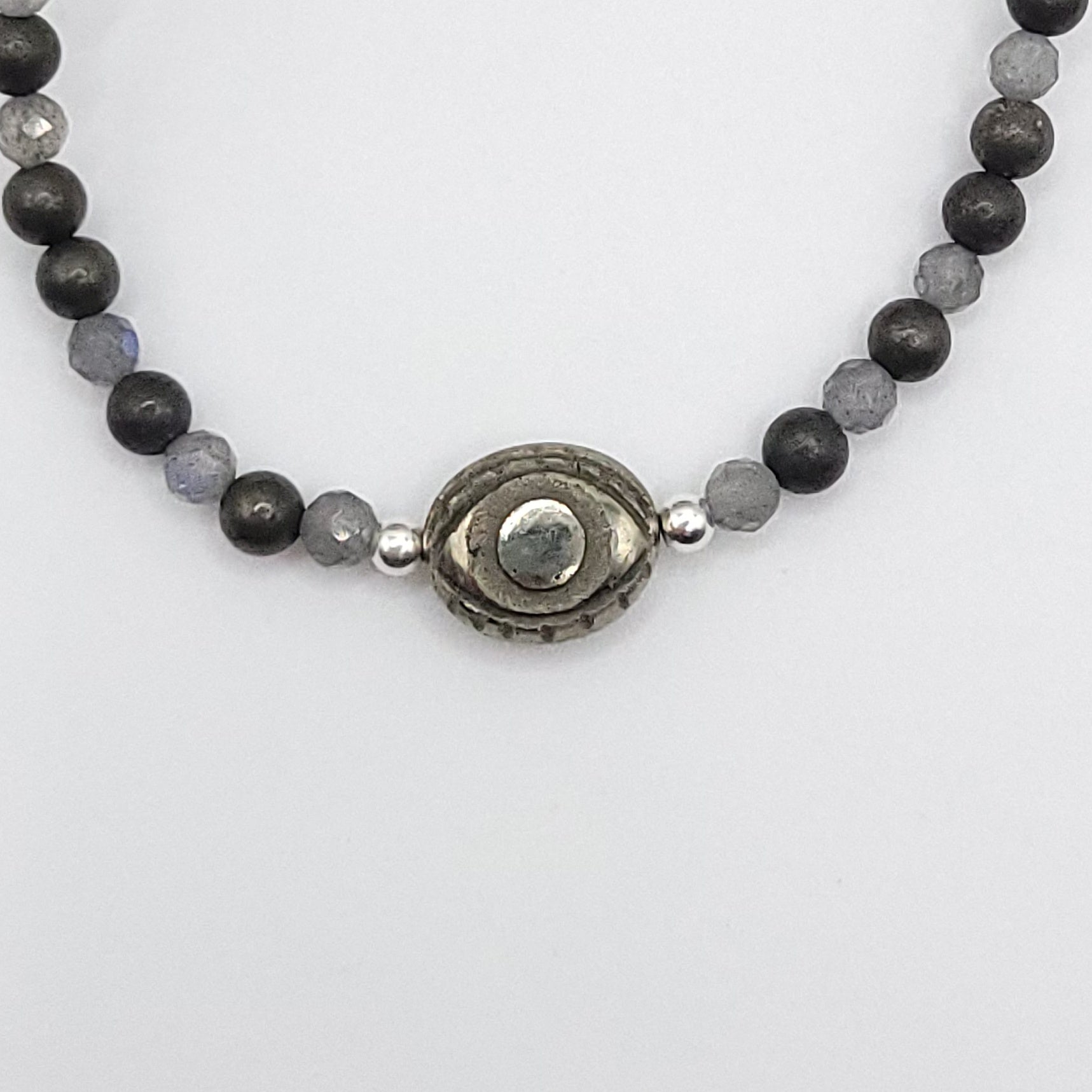 Pyrite Evil Eye necklace featuring 4mm Pyrite and 3mm Labradorite beads for protective strength