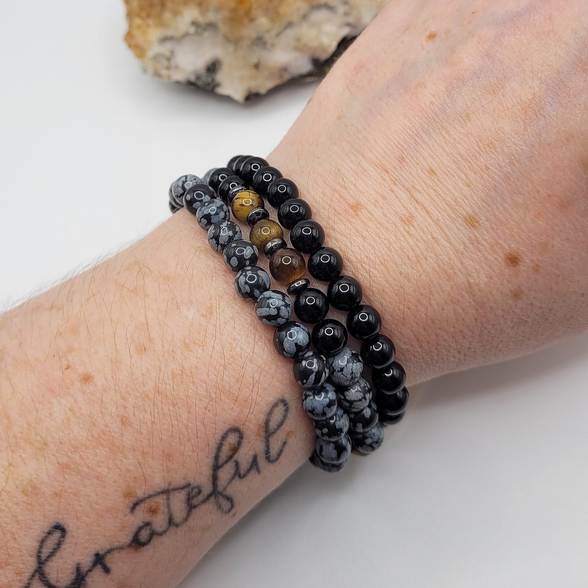 Bracelet Stack – Snowflake Obsidian, Tiger’s Eye & Obsidian, 3 bracelets on wrist
