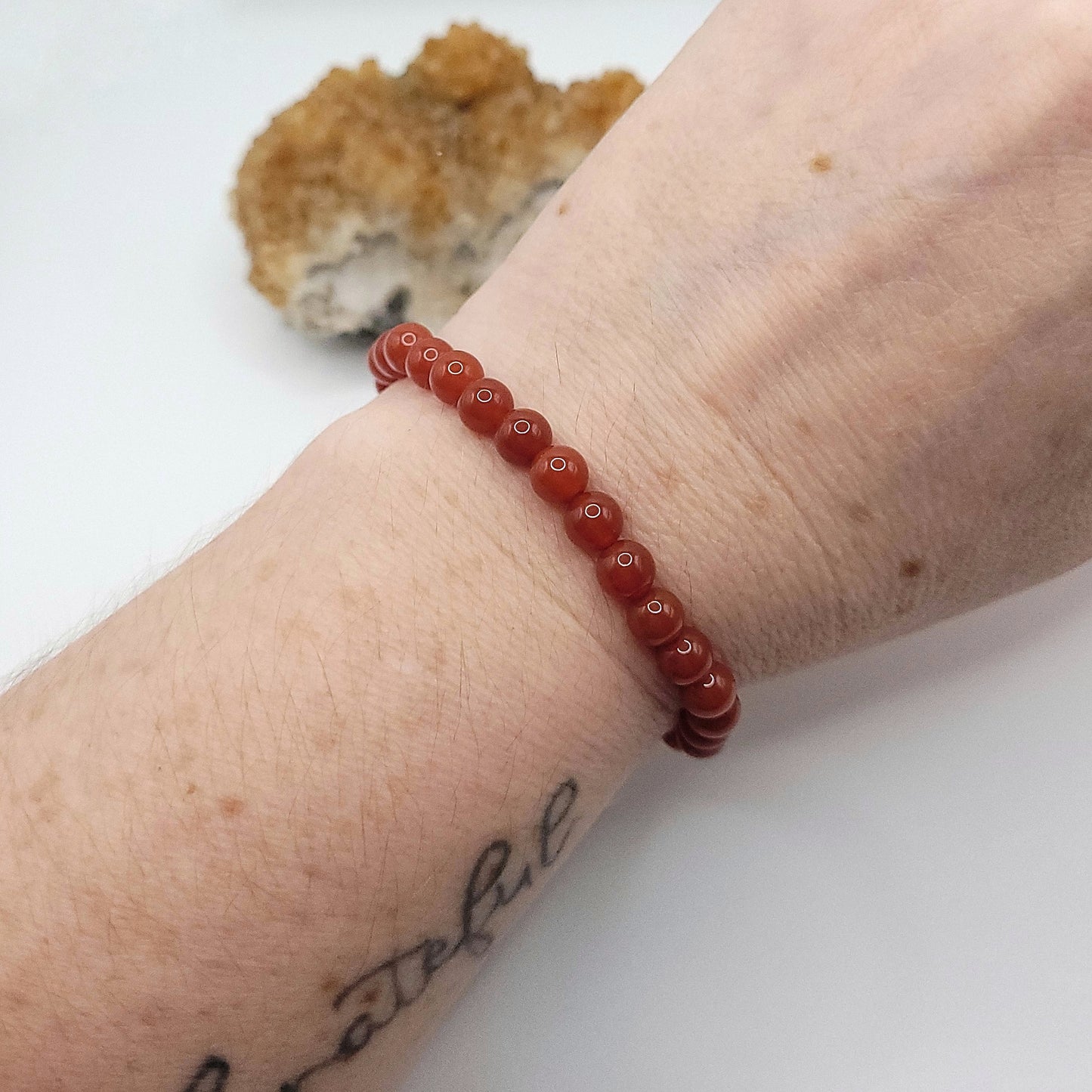 carnelian bracelet, 7" beaded stretch bracelet on wrist
