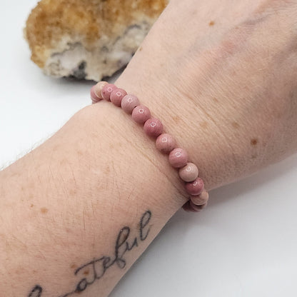 rhodonite bracelet, 7" beaded stretch bracelet on wrist