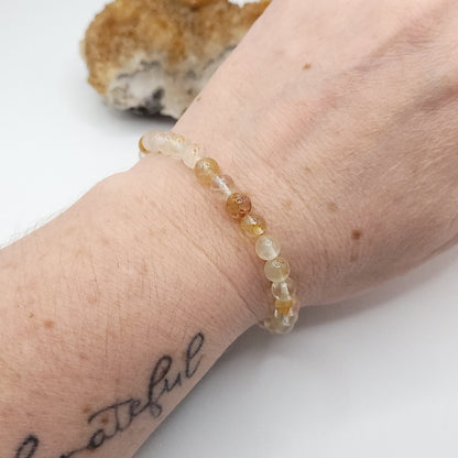 golden healer bracelet, 7" beaded stretch bracelet on wrist