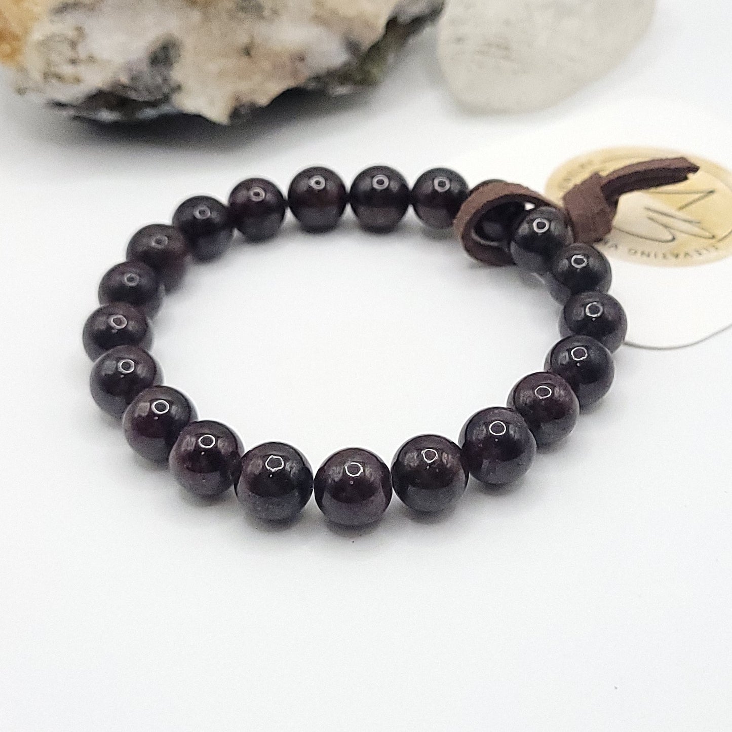 garnet stretch bracelet on white background