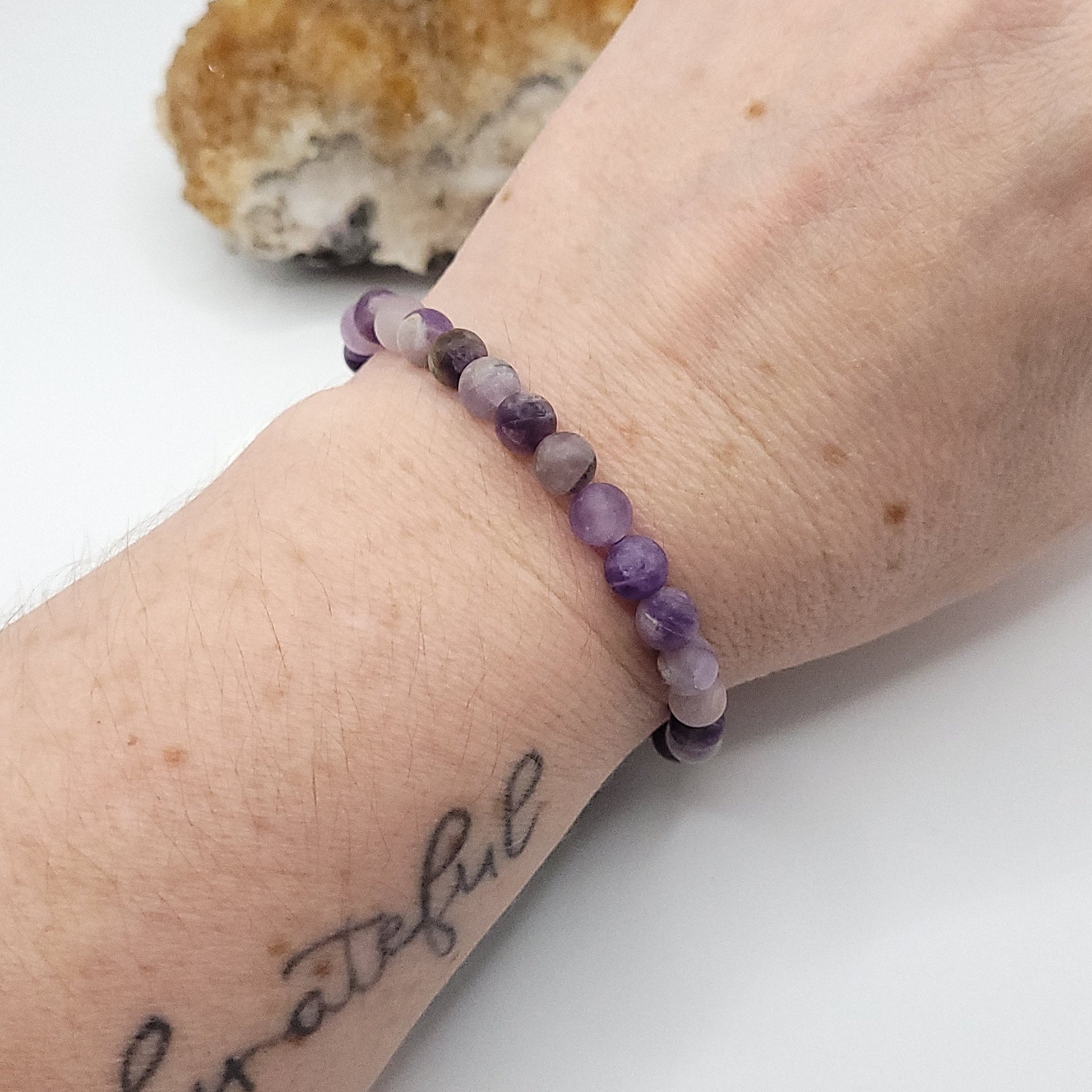matte amethyst bracelet on wrist