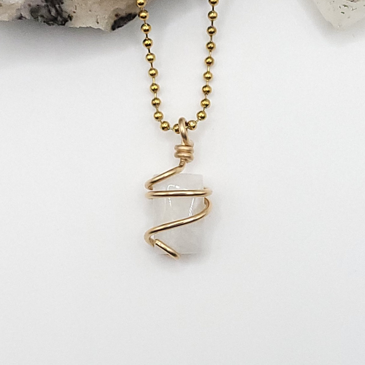 rectangular rainbow moonstone necklace in 14k gold filled on white background