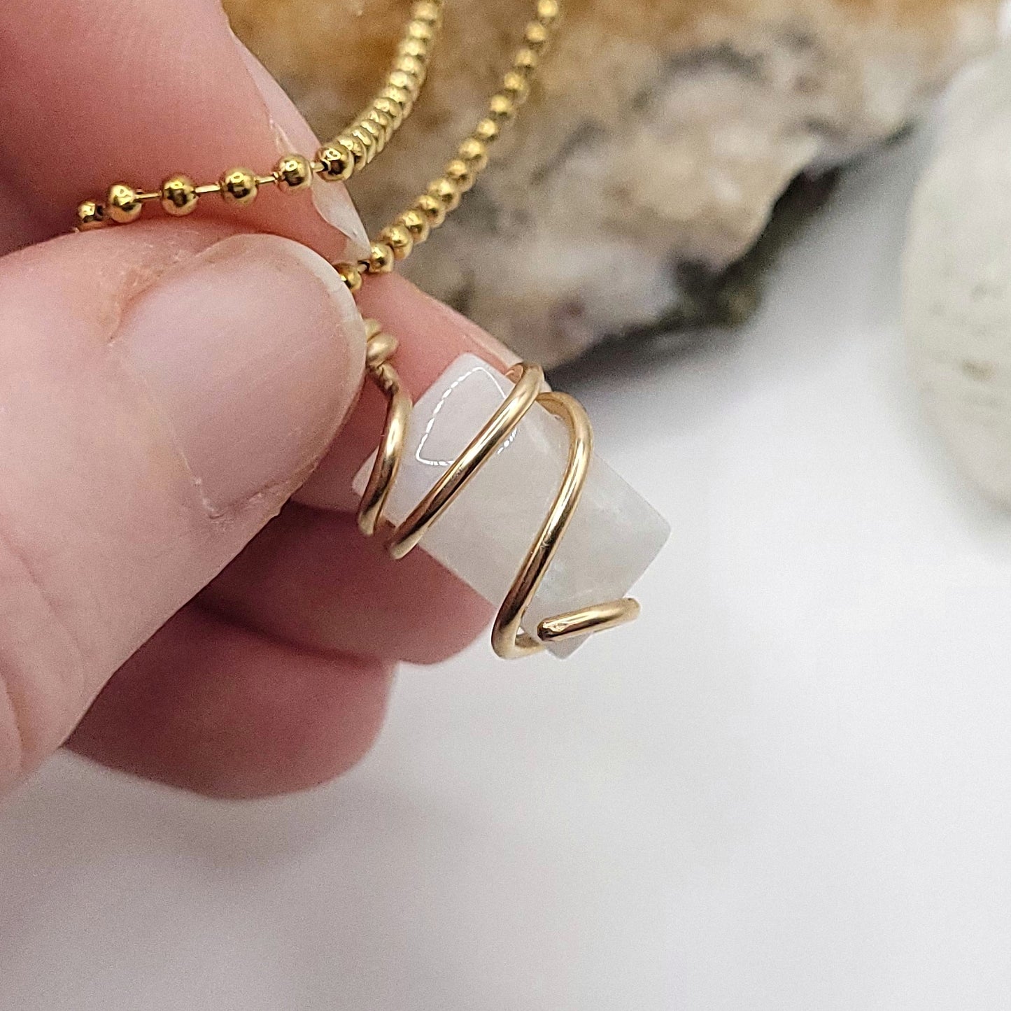 rectangular rainbow moonstone necklace in 14k gold filled in hand