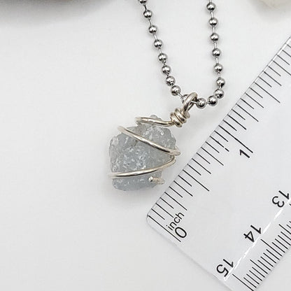 raw celestite necklace in sterling silver next to ruler measuring just over 1 inch