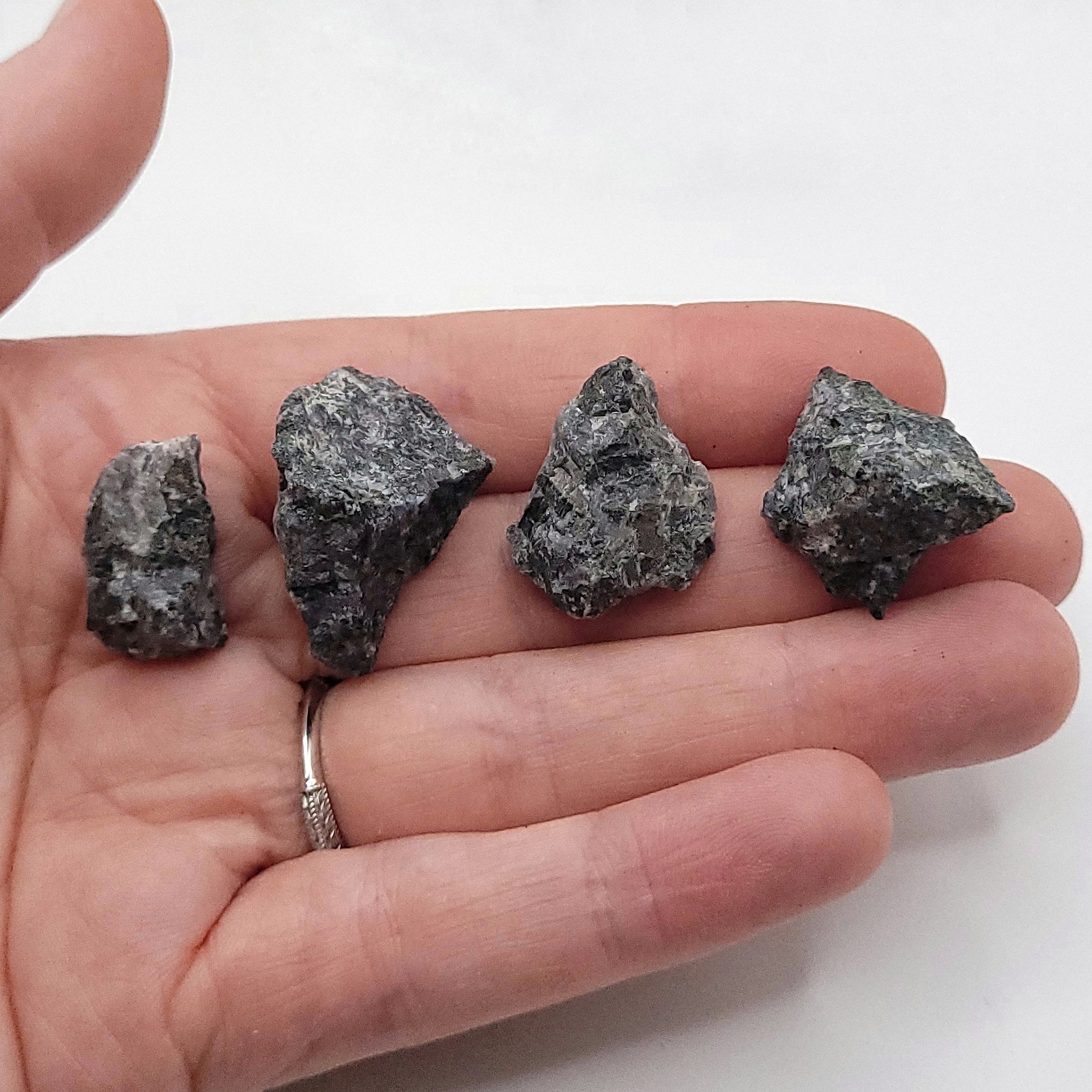 Healing stone jewelry close-up on neutral background