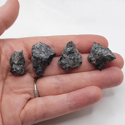 Healing stone jewelry close-up on neutral background