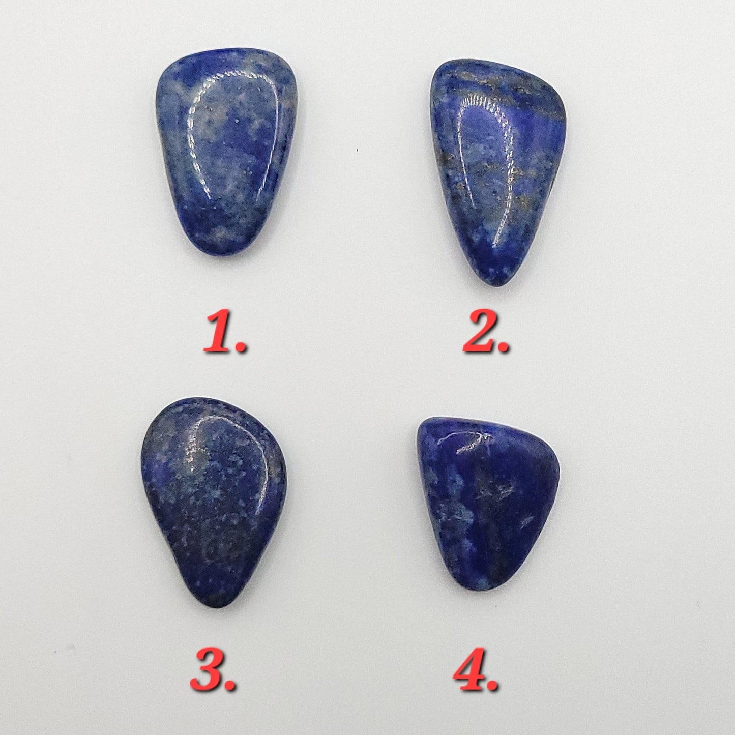 4 Polished Lapis lazuli stones to choose from for lapis lazuli necklace in copper wire
