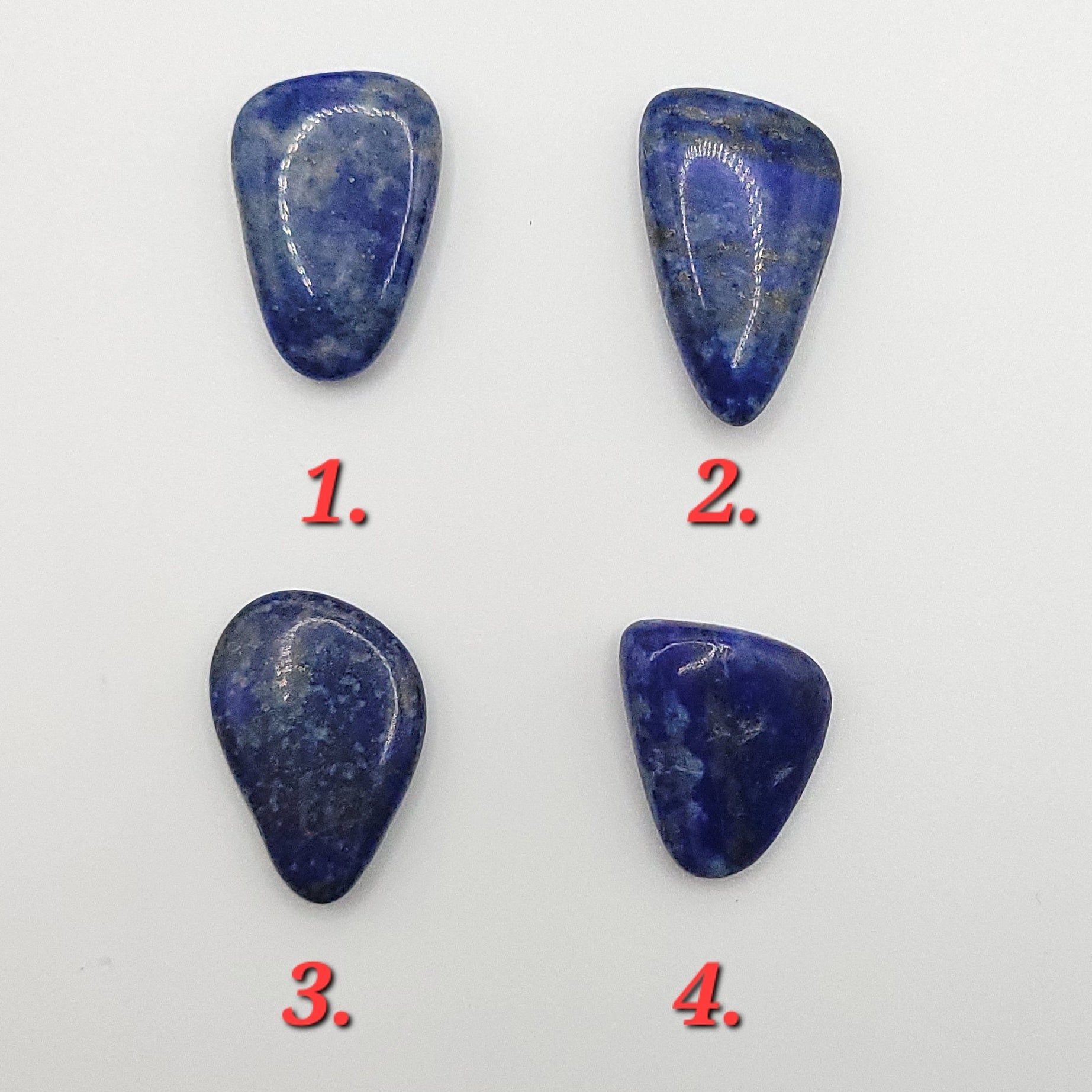 4 Polished Lapis lazuli stones to choose from for lapis lazuli necklace in copper wire
