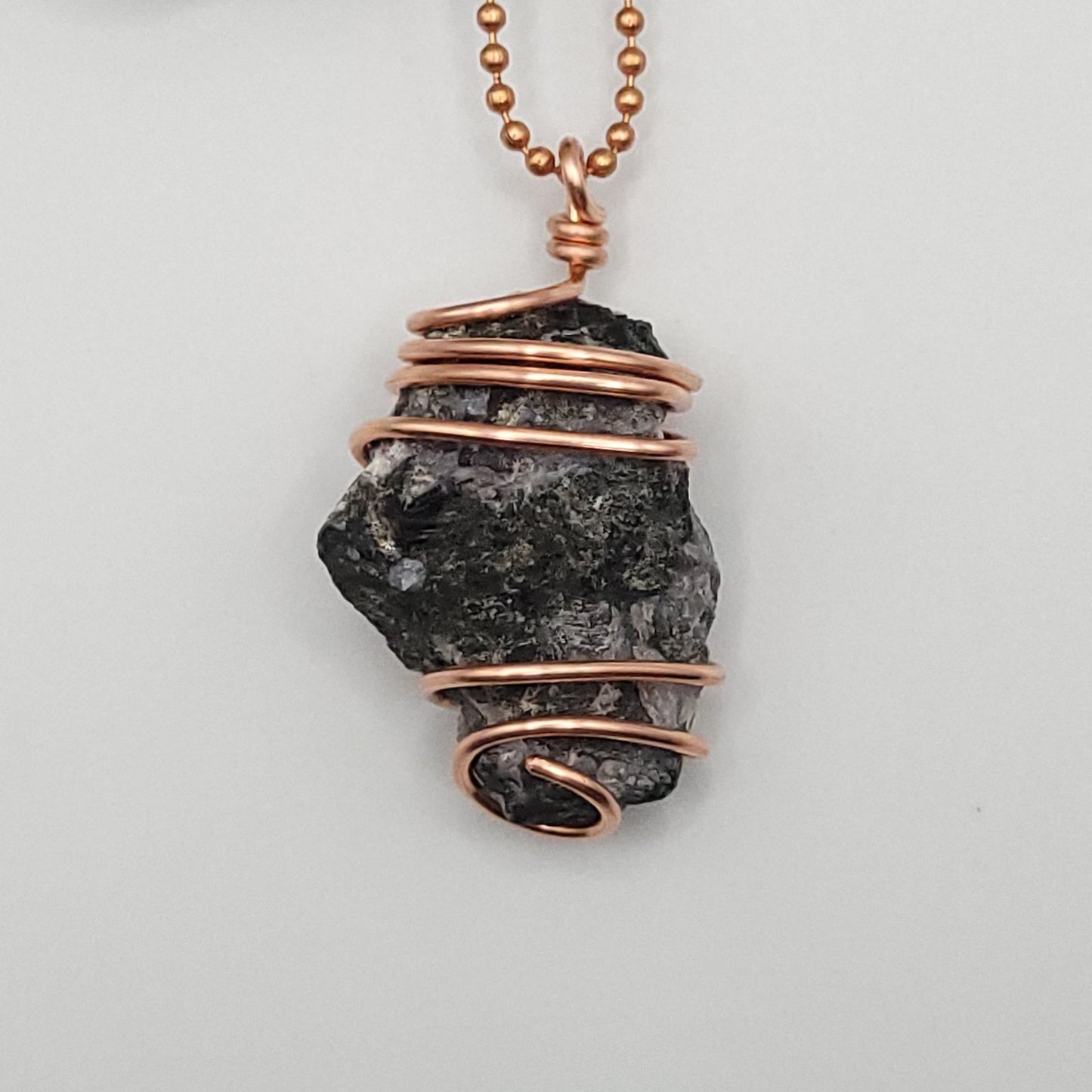 raw mystic merlinite necklace in copper wire on a copper ball chain up close