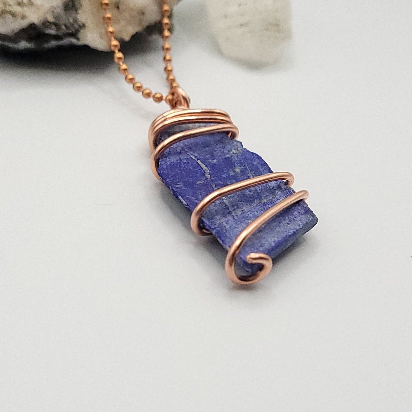 lapis lazuli necklace in copper wire on a copper ball chain side view