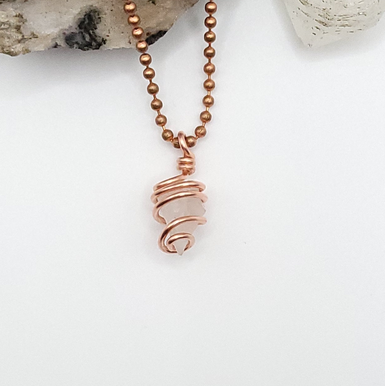 Raw Phenakite Crystal Necklace in Copper, on white background