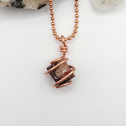 Raw zircon necklace in copper wire, showcasing genuine raw zircon crystal for clarity and inner strength.