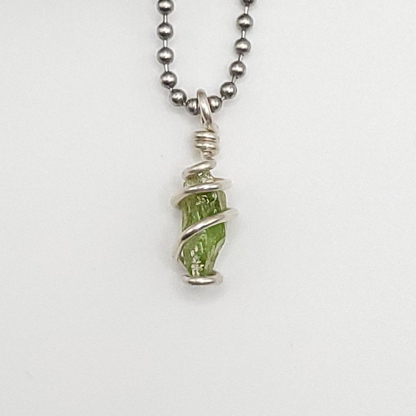 Raw Peridot Crystal Necklace in Silver Wire