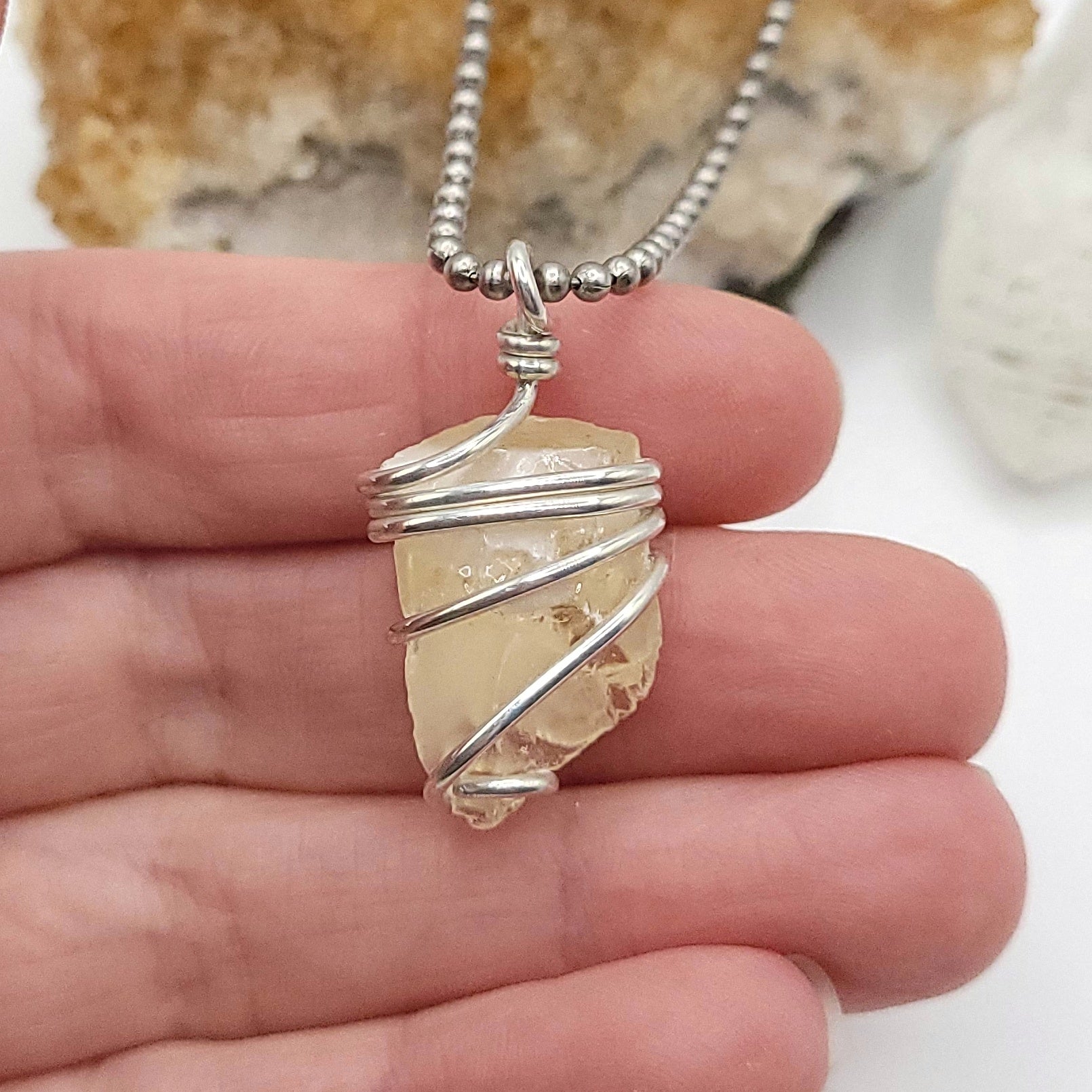 Raw Honey Calcite Necklace in silver with authentic raw Honey Calcite stone and sterling silver wire.