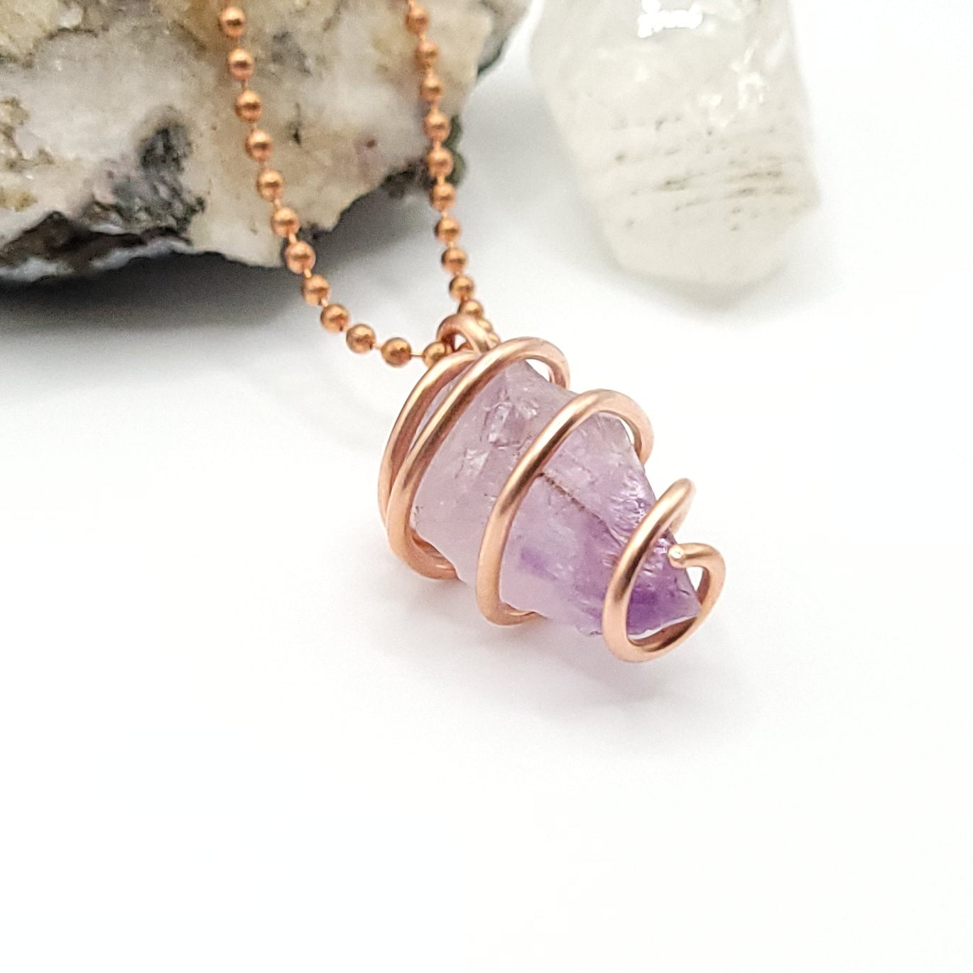 Raw Amethyst Necklace in Copper - authentic amethyst wrapped in pure copper for calm and clarity.